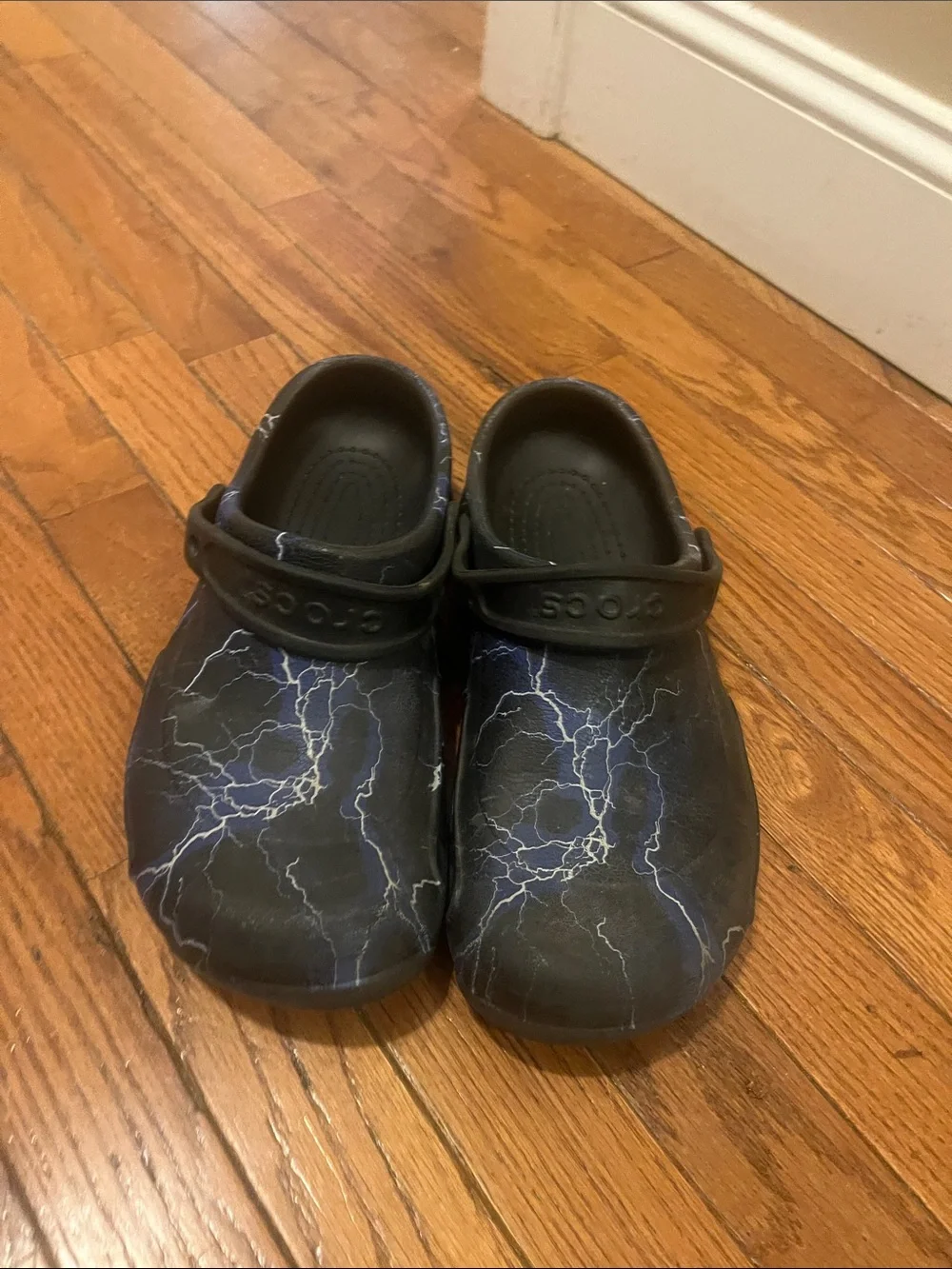 CROCS Kids Black Clogs with Blue and White Lightning Print